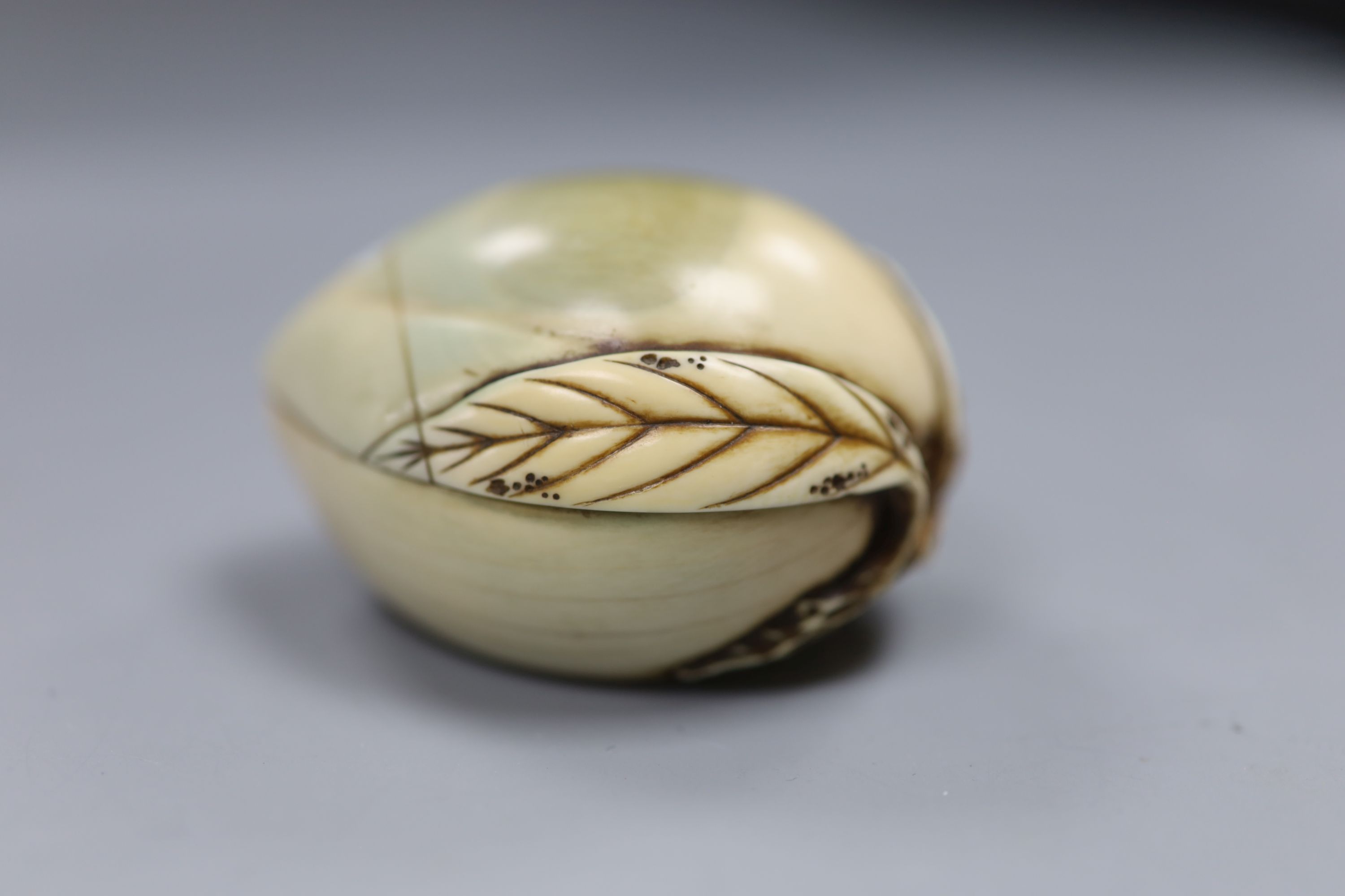 A Chinese ivory peach box, width 7cm